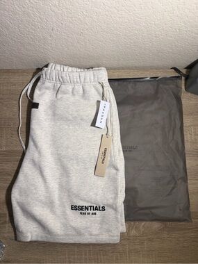Fear of God ESSENTIALS Men's Cream Gray Sweatpants with Black Logo